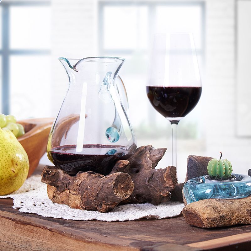 Molten Glass Water Jug on Wood