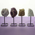 Epidote Mineral Specimen on Black Metal Stand